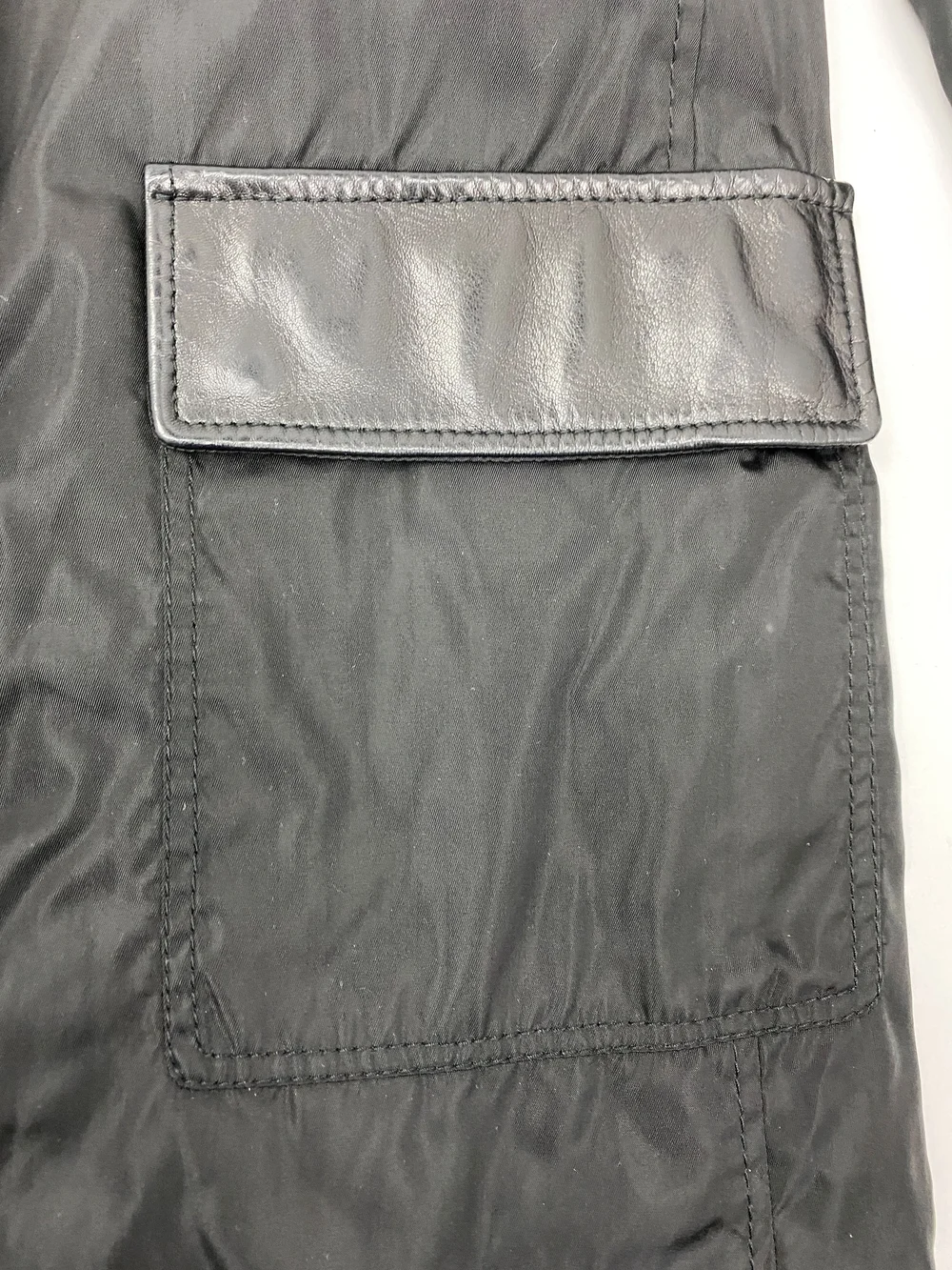 Prada 90s nylon and leather coat — JAMES VELORIA