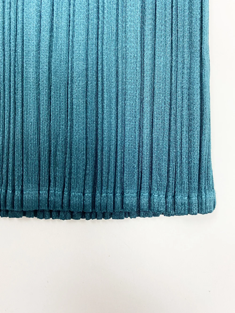 Pleats Please teal cropped pleated pants — JAMES VELORIA
