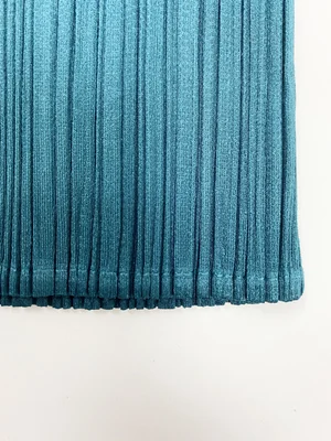 Pleats Please teal cropped pleated pants — JAMES VELORIA