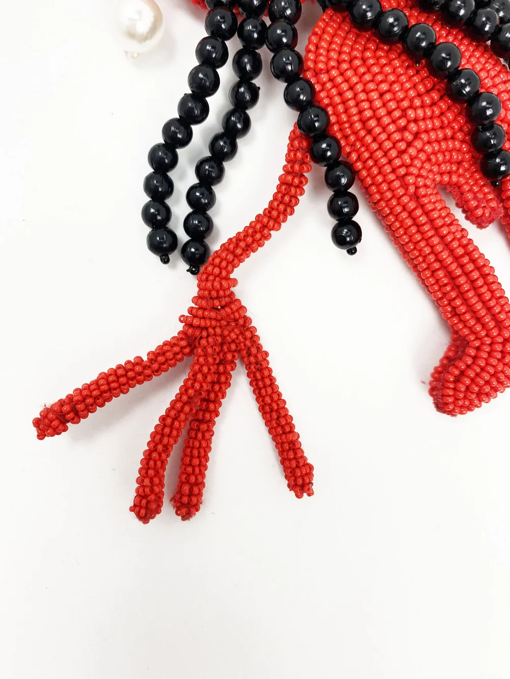 Walter Van Beirendonck beaded red creature necklace — JAMES VELORIA
