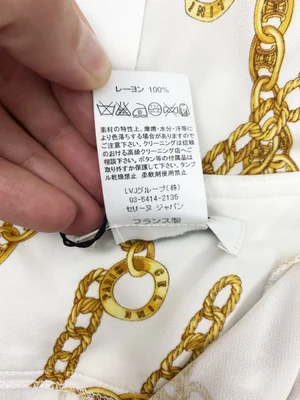 Celine S/S 2004 gold chain print wrap skirt — JAMES VELORIA
