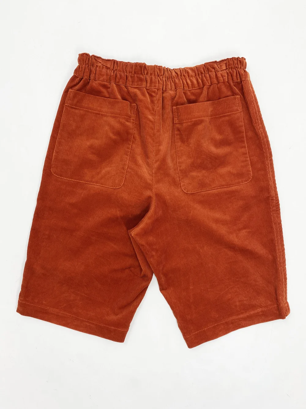 Comme des Garcons SHIRT rust corduroy shorts — JAMES VELORIA