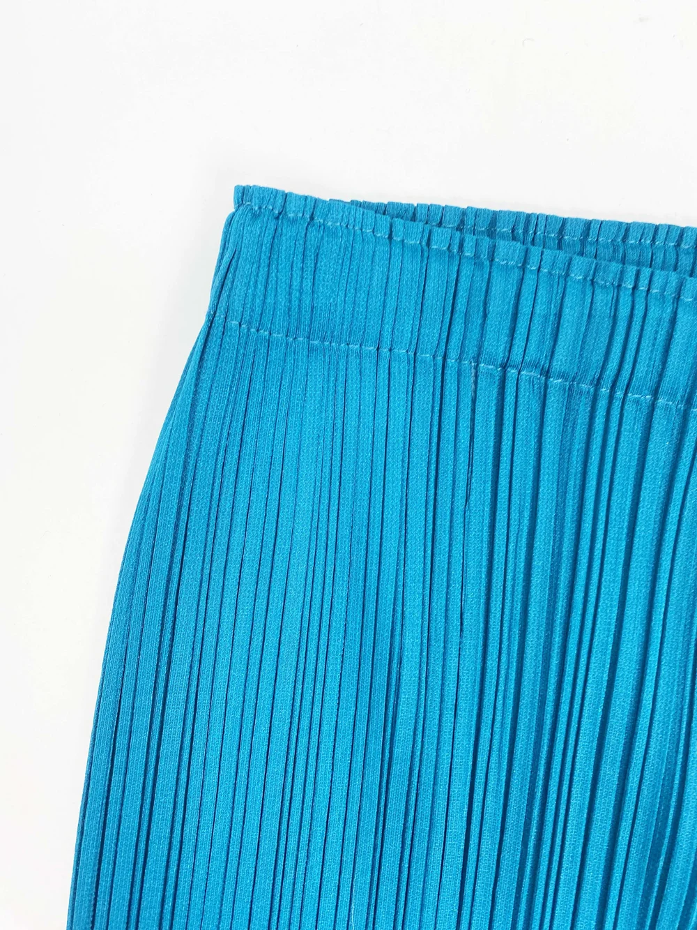 Pleats Please blue pleated pants — JAMES VELORIA