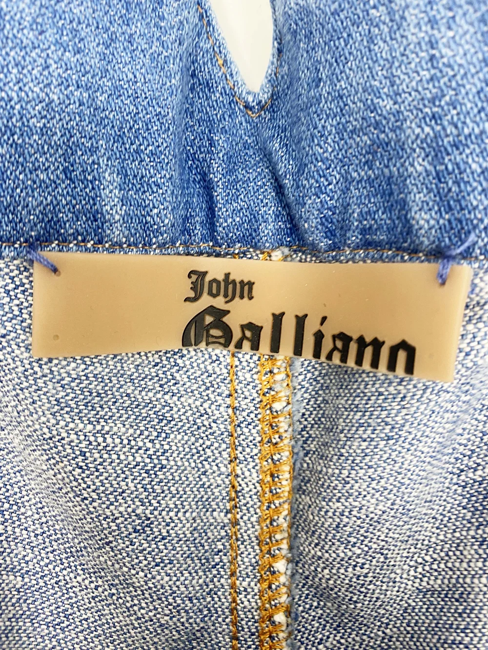 John Galliano blue denim curved leg jeans — JAMES VELORIA