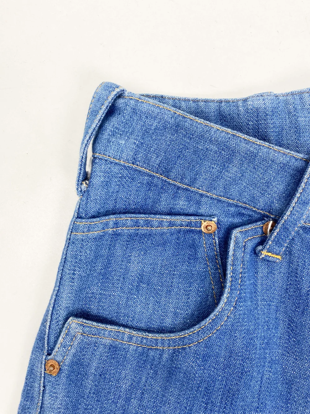 John Galliano blue denim curved leg jeans — JAMES VELORIA