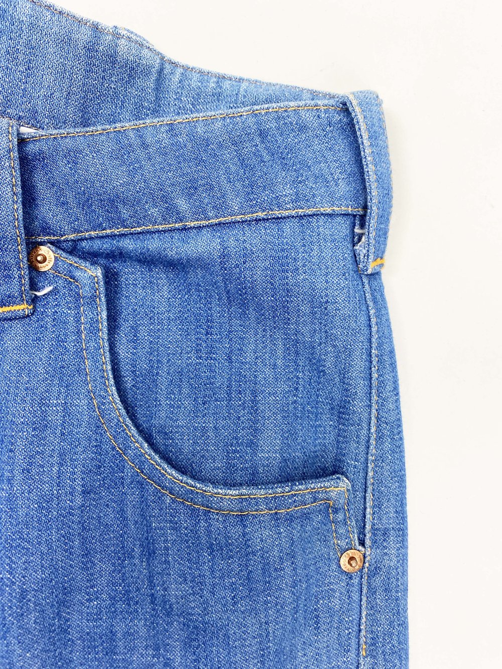 John Galliano blue denim curved leg jeans — JAMES VELORIA