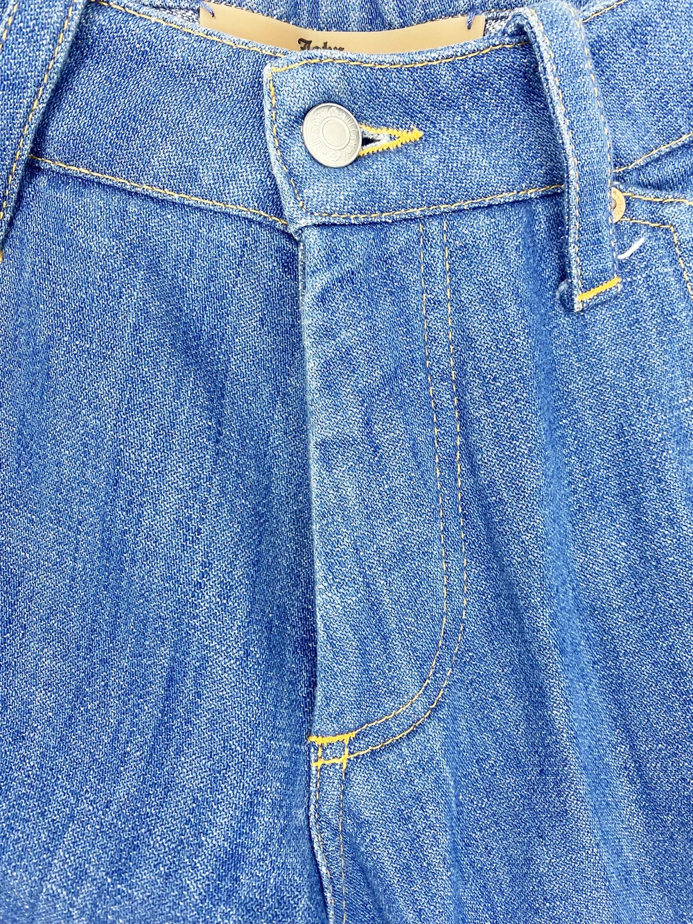 John Galliano blue denim curved leg jeans — JAMES VELORIA