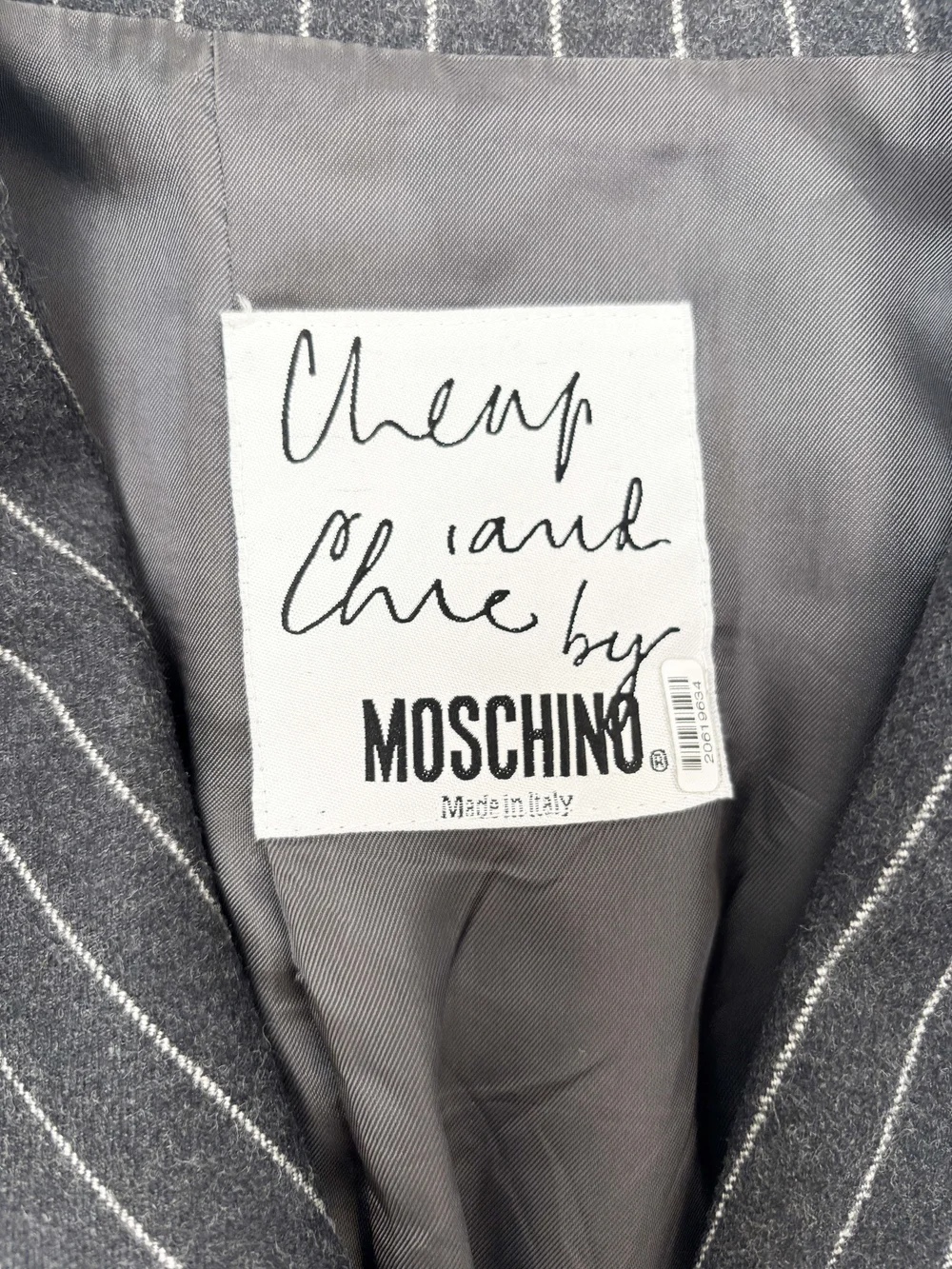 Moschino 90s twisted pinstriped skirt suit — JAMES VELORIA