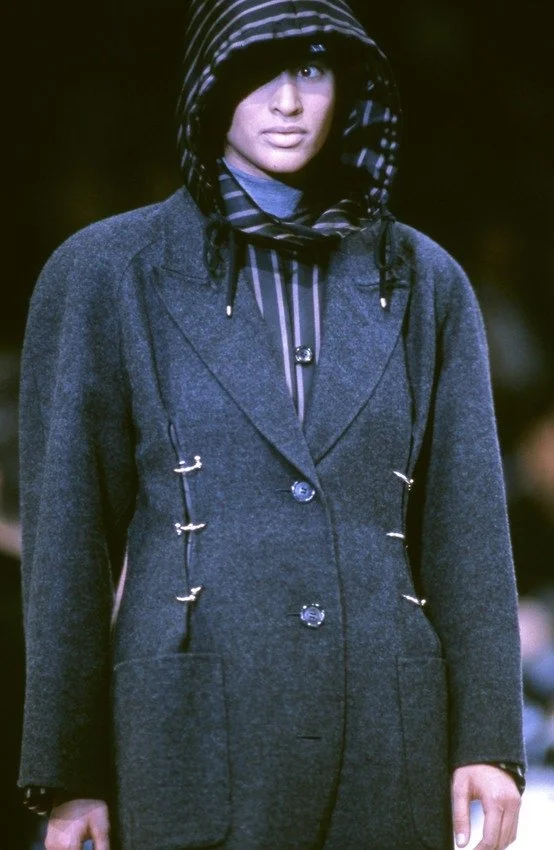 issey-miyake-fall-winte-1991-knit-green-piercing-jacket-deconstructed-vintage-japan-1990s-90s-cutouts-metal-runway.jpg
