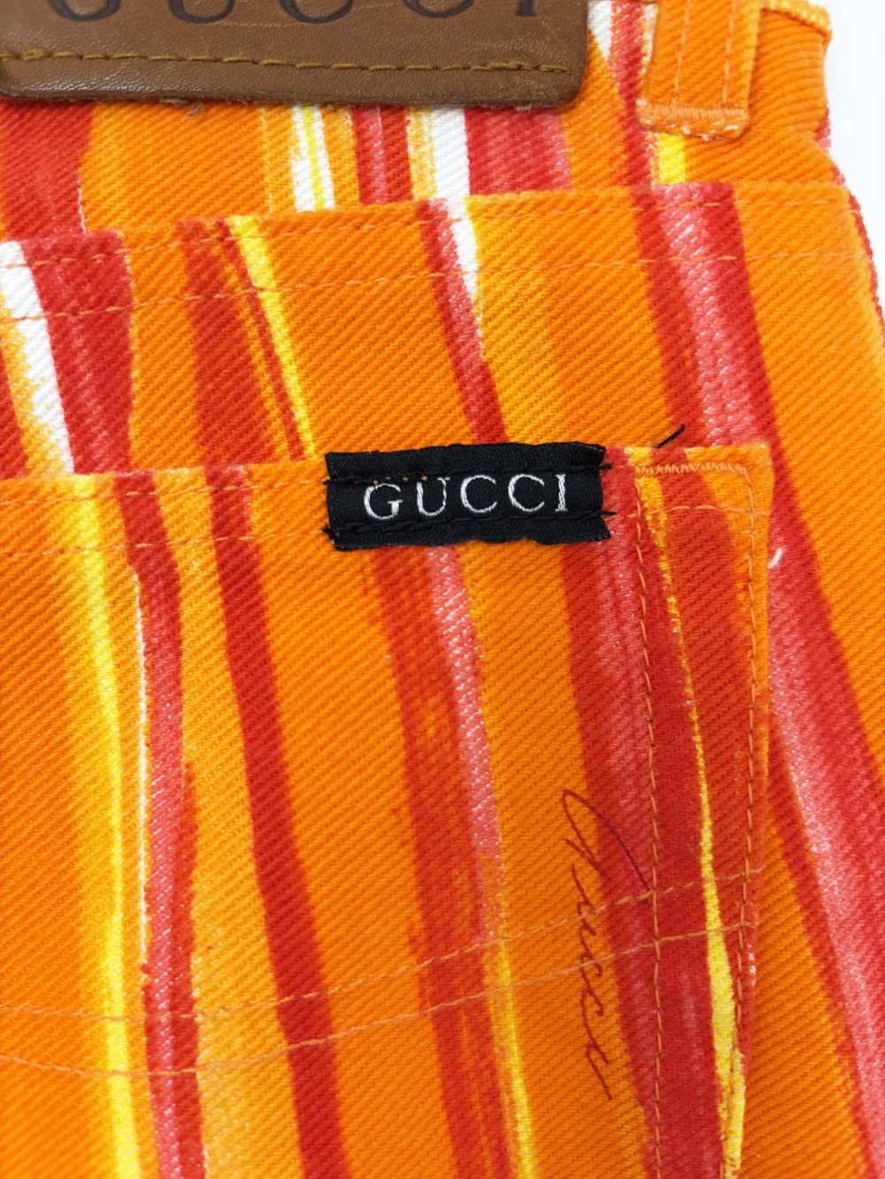 Gucci S/S 1996 orange paint streak jeans — JAMES VELORIA