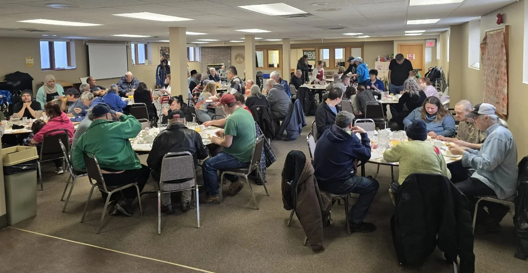 People eating at Saturday Meals Together