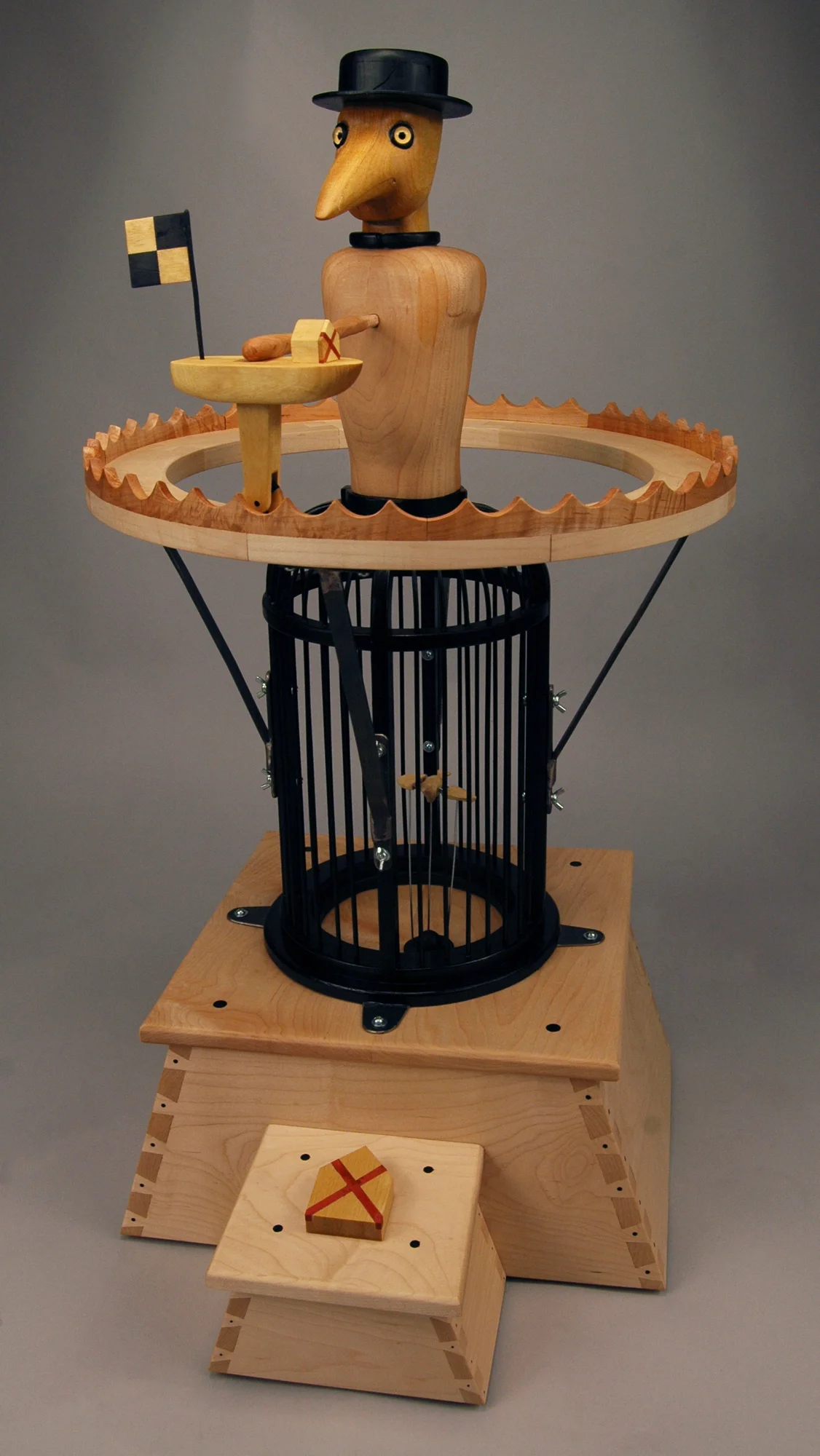 1. Title: Under a Yellow Flag Media: Wood, steel, paint, motors, electrical elements Dimensions: 38"h x 32"w x 32"d