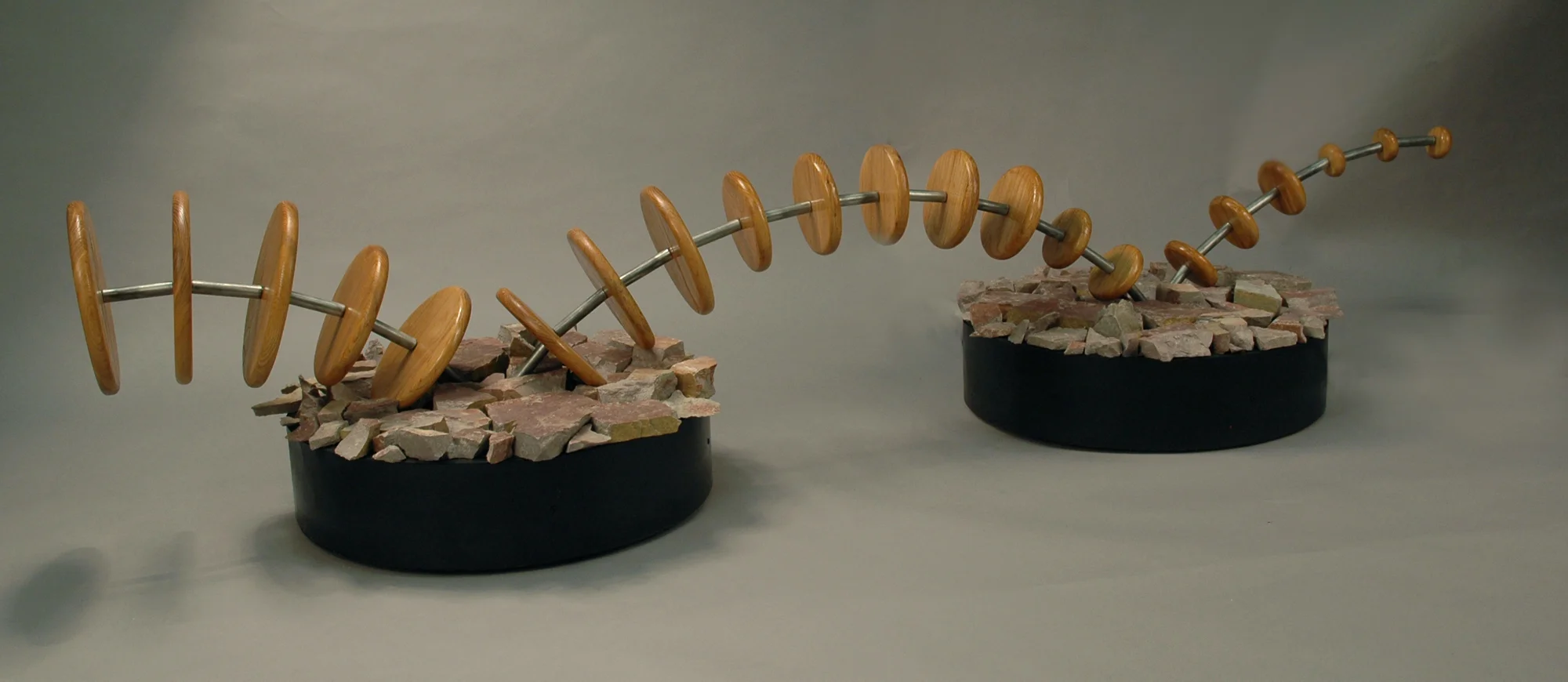 6. Assignment: Captured Motion Media: Wood, steel, stones, concrete, paint Dimensions: 22"h x 90"w x 28"d