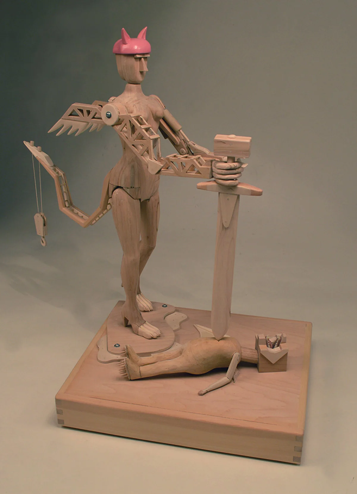 8. Building a Movement (after George Lopez) Media: Wood, paint, plastic, and string Dimensions: 26"h x 20"w x 16"d