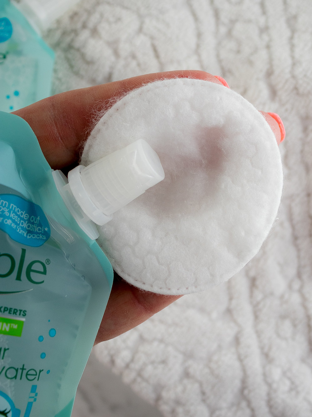 Simple Micellar Cleansing Water Sachet in Use on Cotton Round
