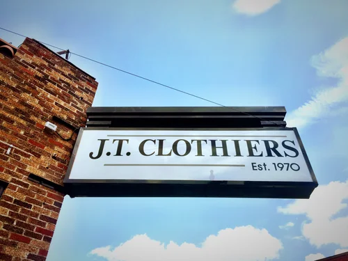 a picture of the J.T. Clothiers outdoor sign