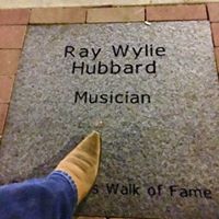 Ray Wylie Hubbard and his boot, as he stepped over to view his stone before a gig at Dan's Silver Leaf last year.