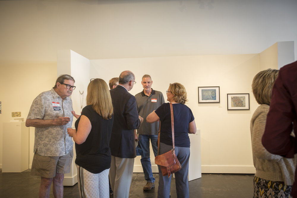 MSA Members connect over drinks among the beautiful art. Photo Cred: Tammi Paul