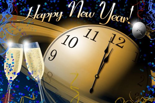 a picture that says happy new year with a clock and glasses of champagne on it 