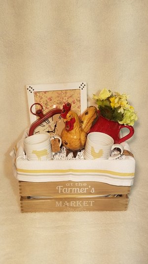 a picture of a gift basket full of goodies sitting against a white background.