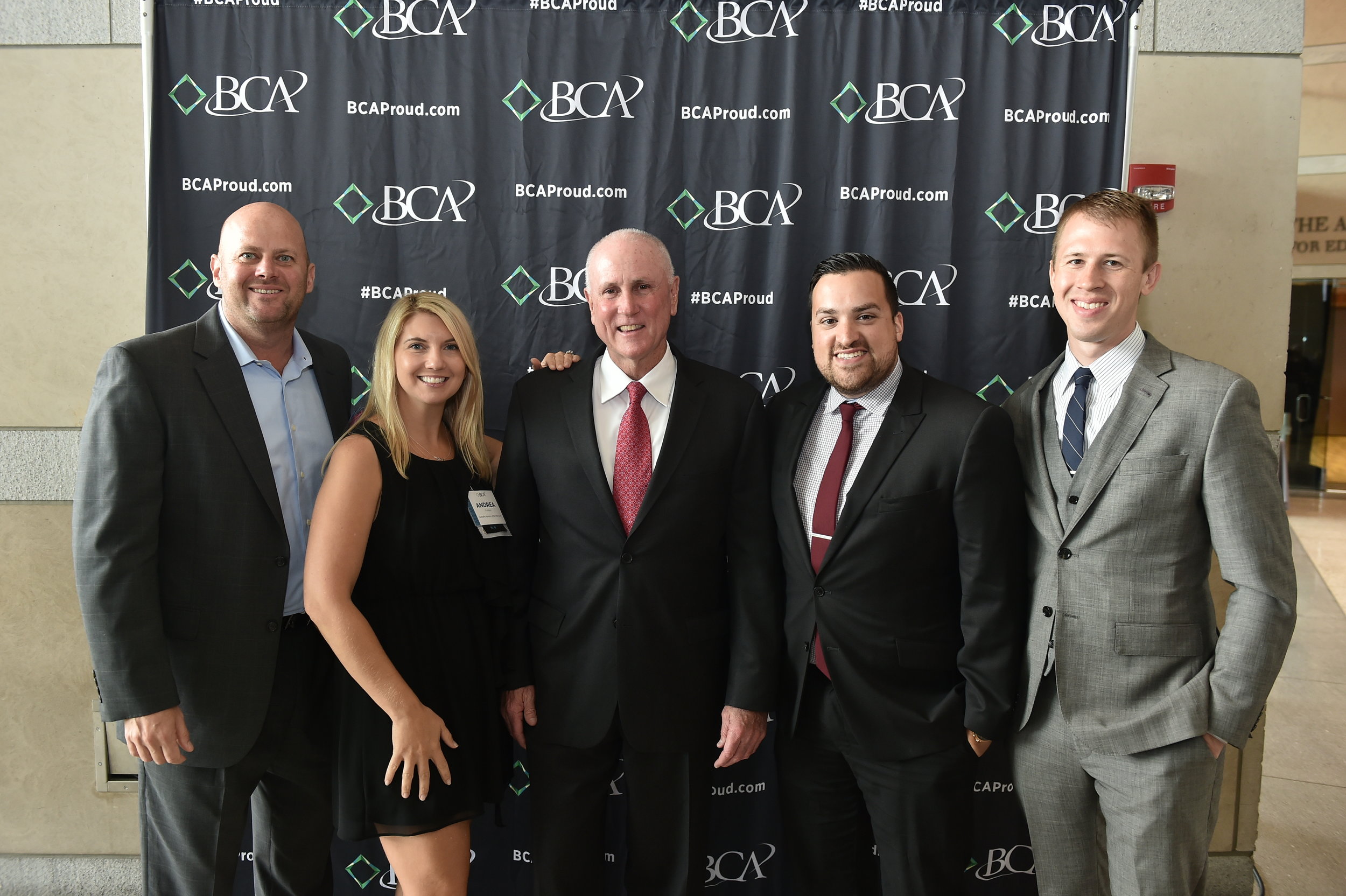 20/20 and their membership sponsors, Chris and Andrea Drucquer (left), met Col. Mark Tillman, a former Air Force One pilot who captained the presidential plane on 9/11, and shared his inspiring story with BCA.