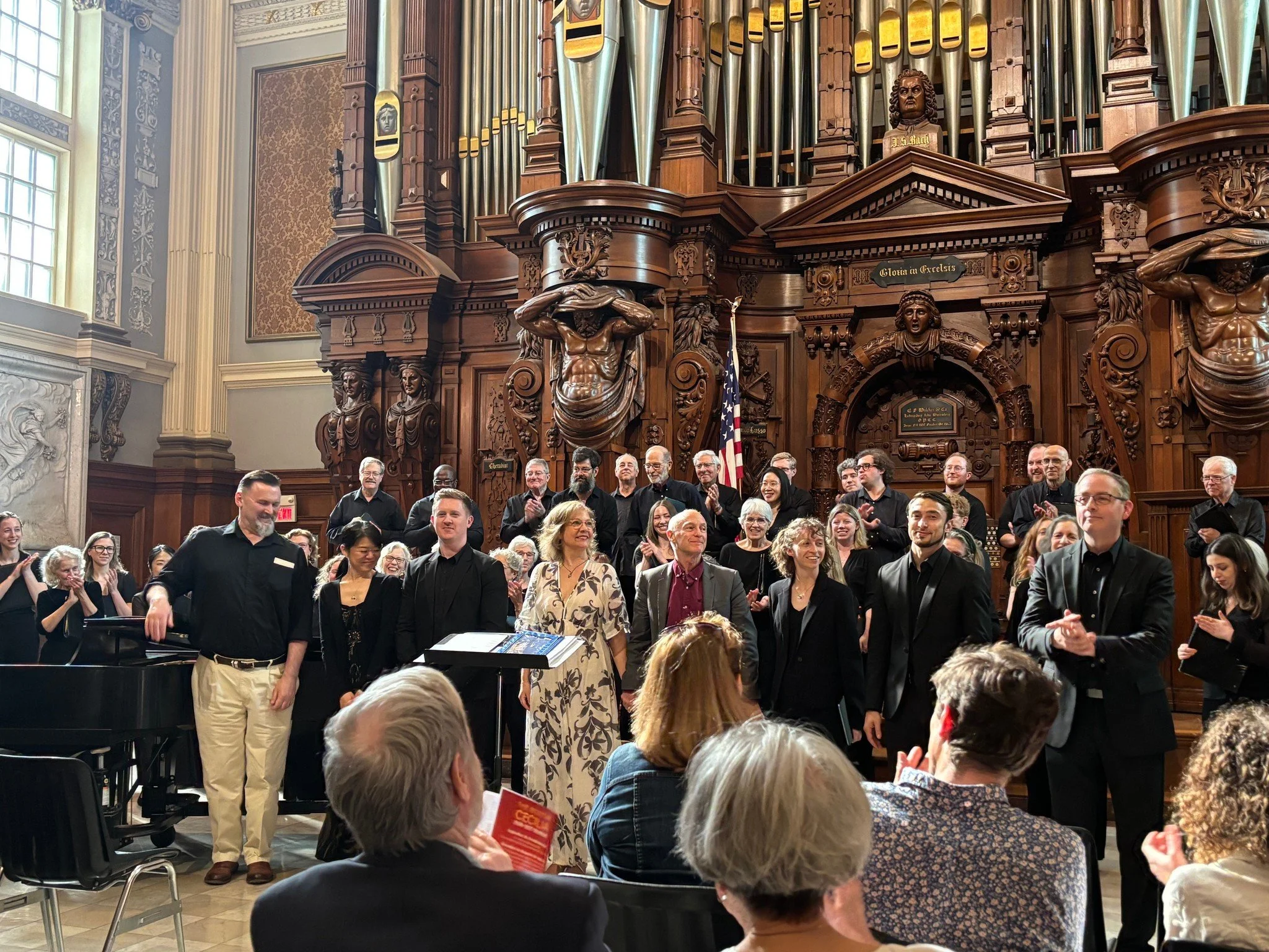 Cecilia taking a bow with composers and soloists at our May concert in Methuen
