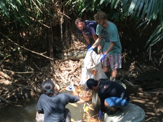 Cleaning the river at Jiwa Damai in BaliCleaning the river at Jiwa Damai in Bali
