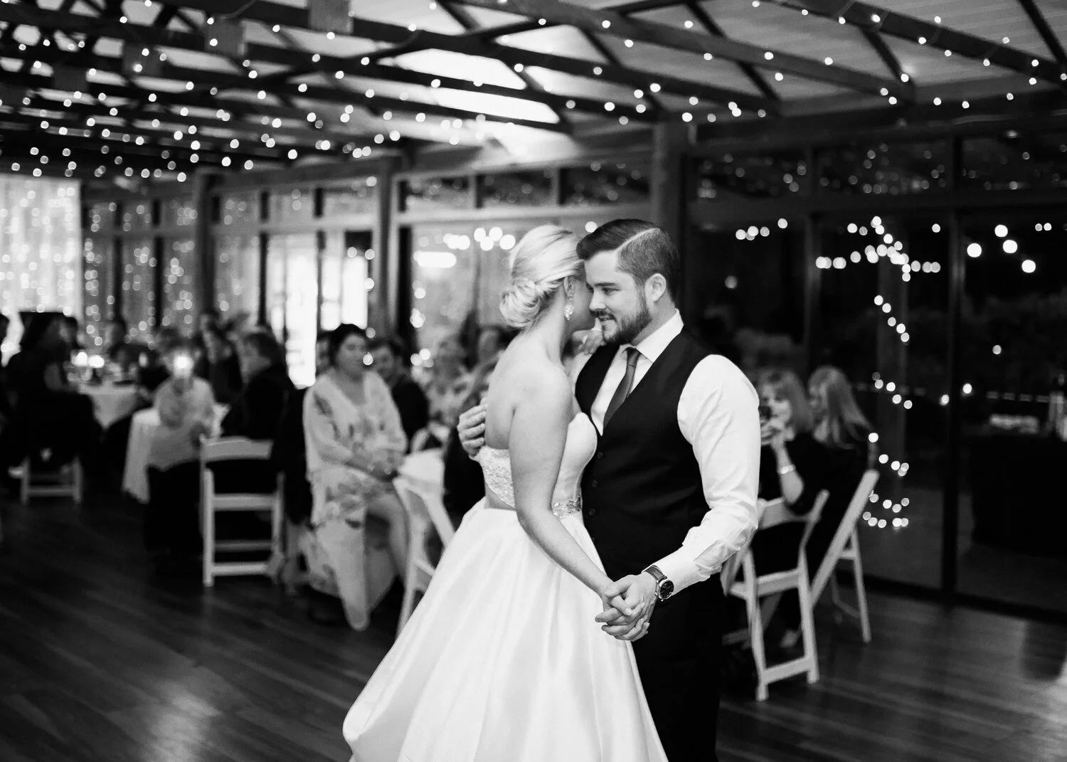 Bonnie and Tom in a world of their own during their first dance at their wedding in Brisbane.