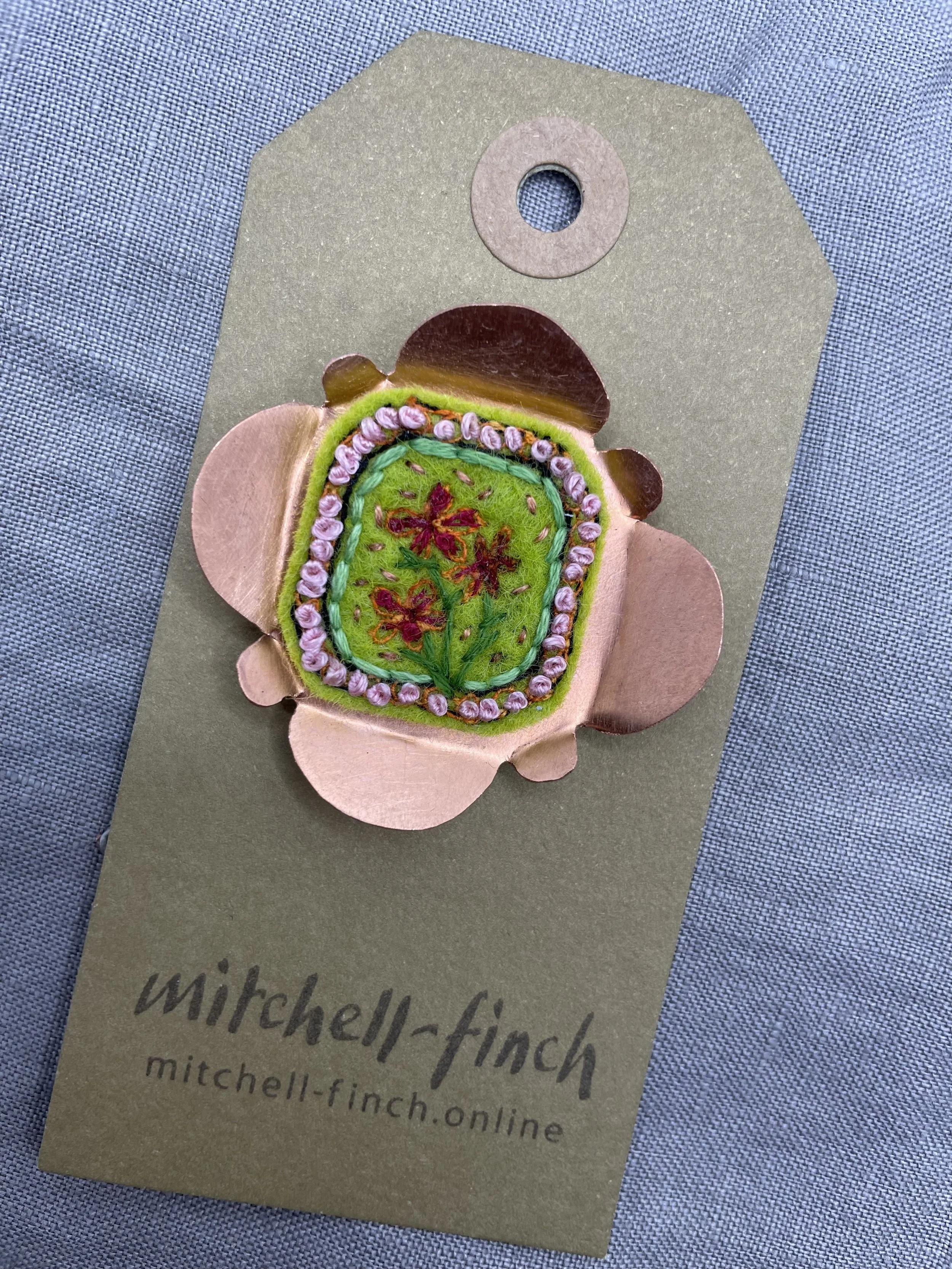 large copper flower brooch.jpg