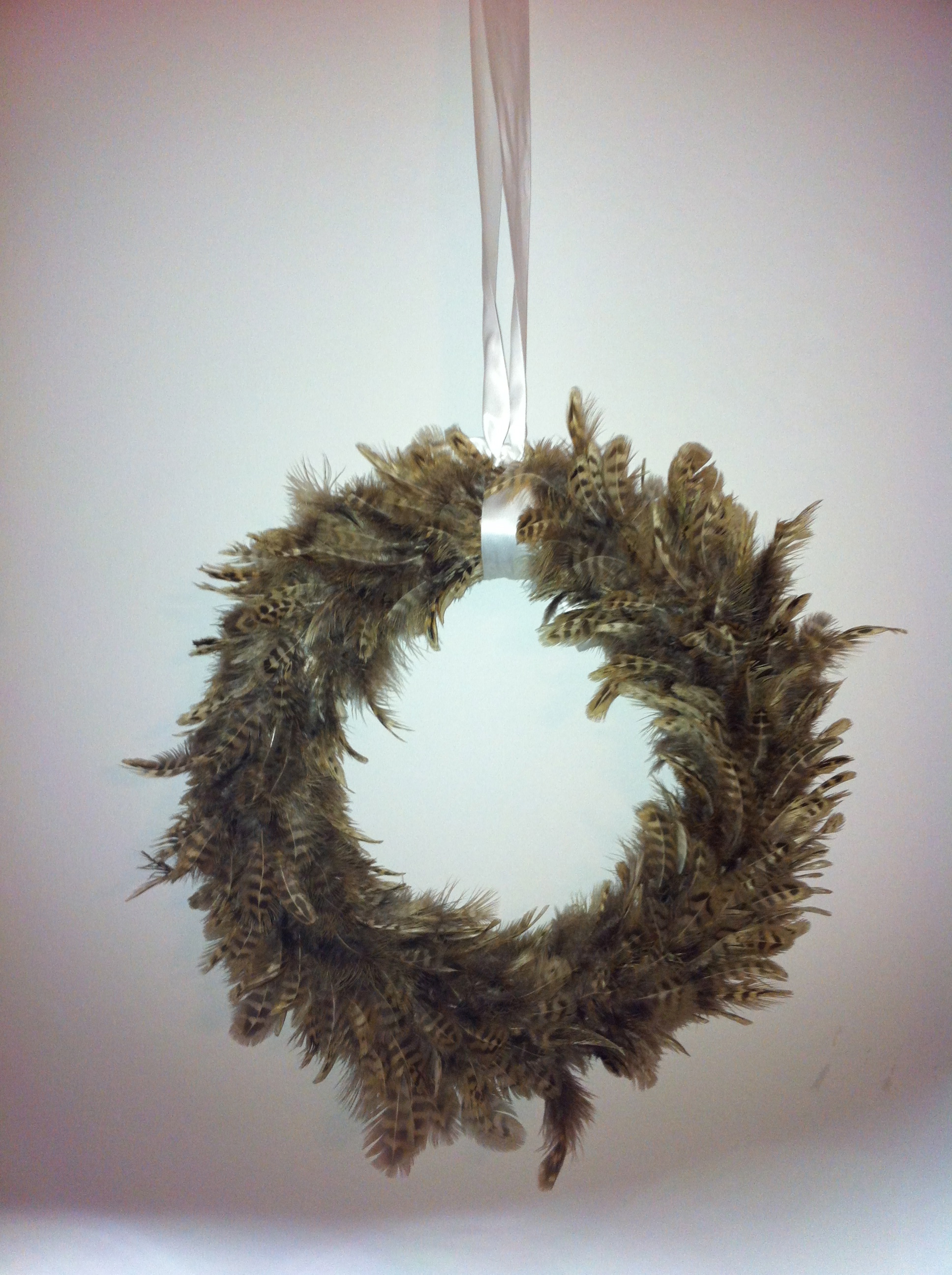 Handmade feathered wreath £10