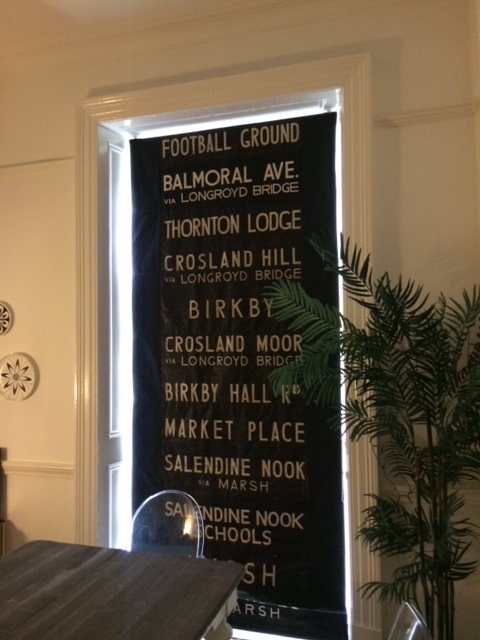 Full length roman blind made from vintage bus destination blind