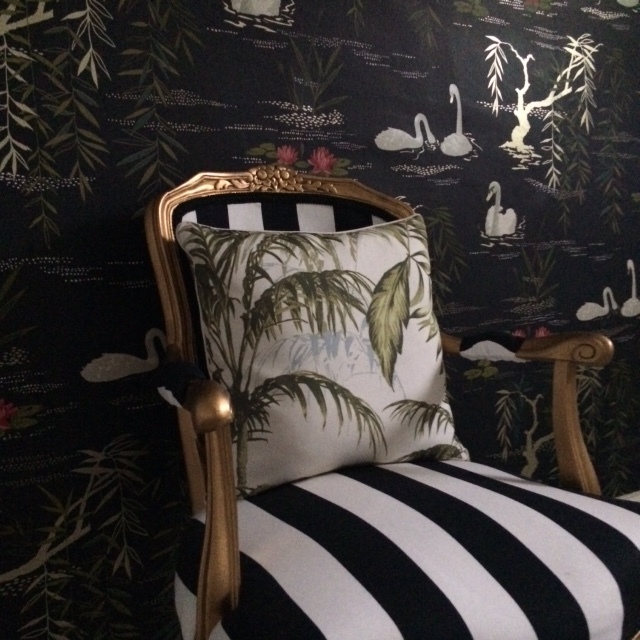 Sainsbury's Botanist cushion and Ikea striped fabric. Swan Lake wallpaper £67 per roll by Nina Campbell. 