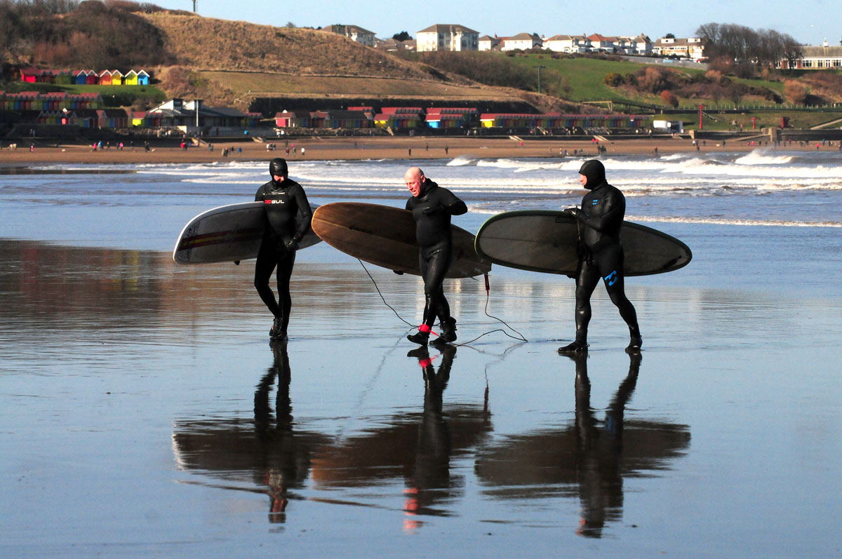 Learn to surf at Dexter's Surf School at The Sands