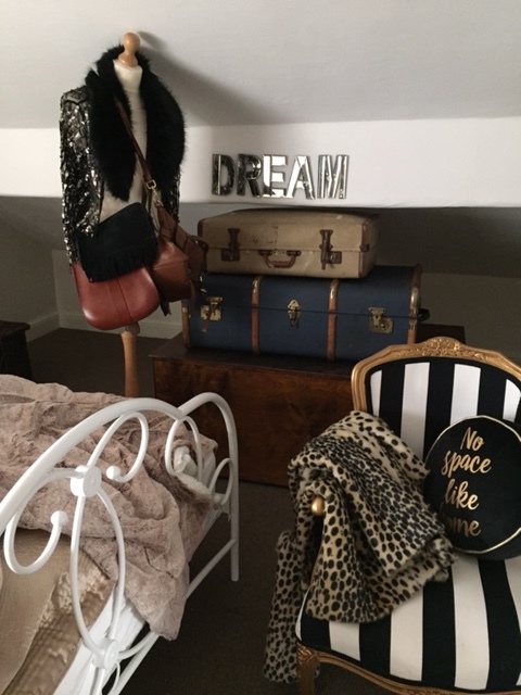 Vintage trunks make great guest room storage