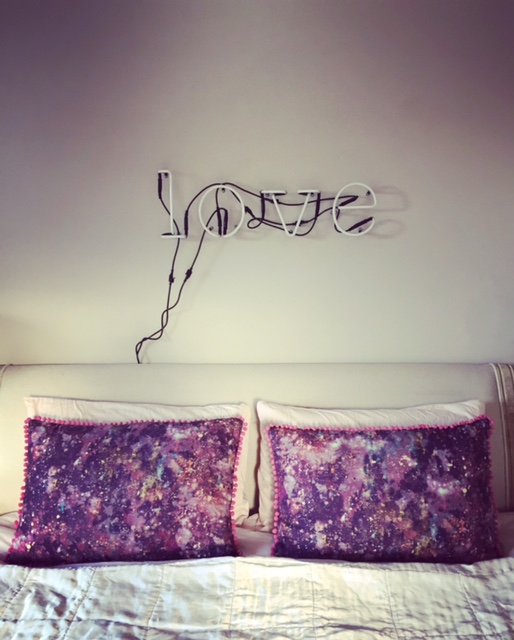 Bolster cushions made from Osmosis in Self Heal by Earthed Fabrics.