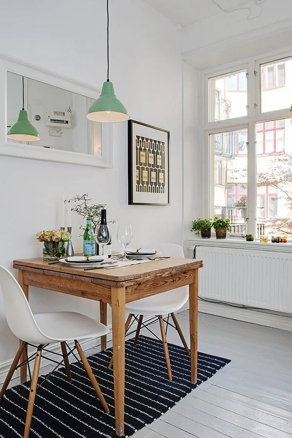 Table for two? Yes please! Keep it simple, but consider an expandable table for dinner parties. Via Pinterest / À la mode Montréal .