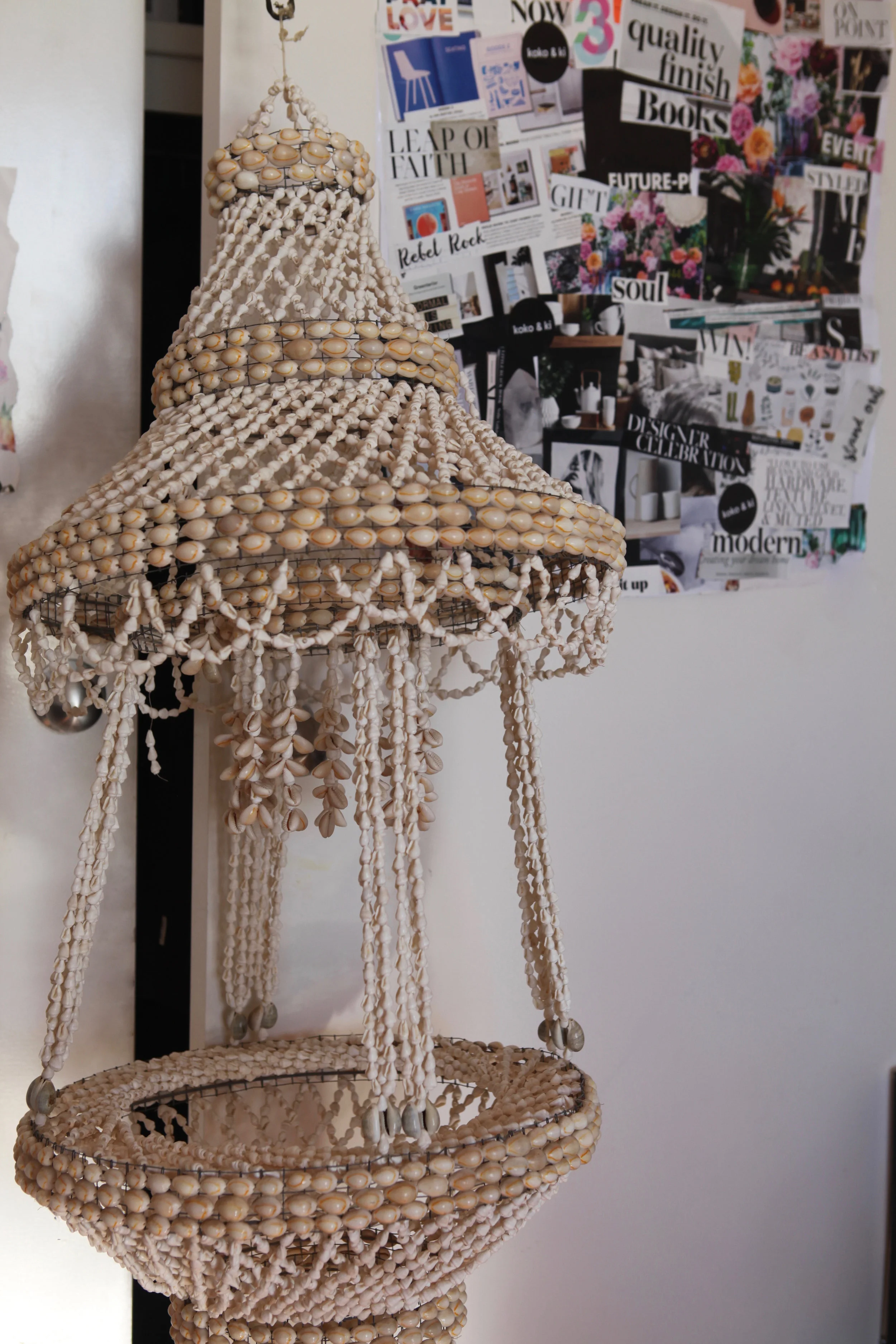 I have this cool cascading cowrie wall shell hanging that belonged to mum. I love the vintage & island vibe of this thing! Right now, it's hanging precariously on a coat hanger against my wardrobe lol