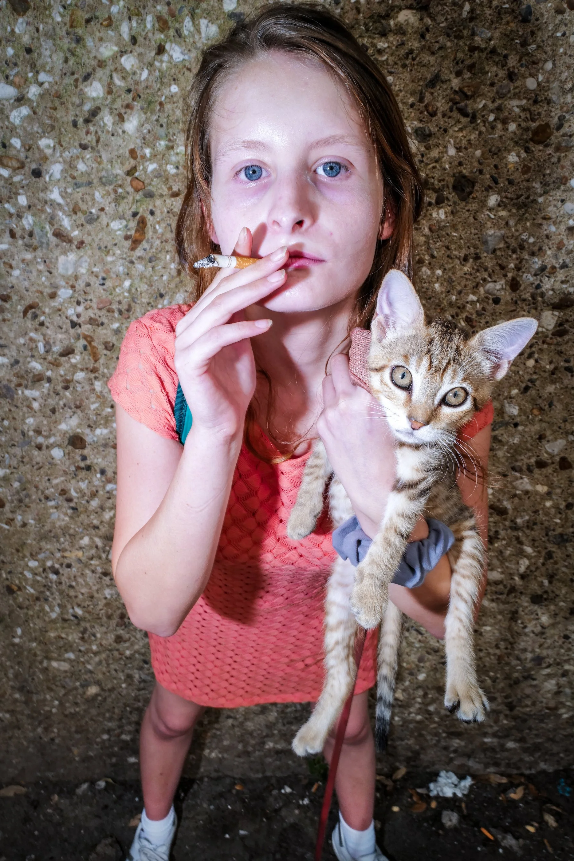 Girl and Her Cat at Bus Stop, Houston 2022