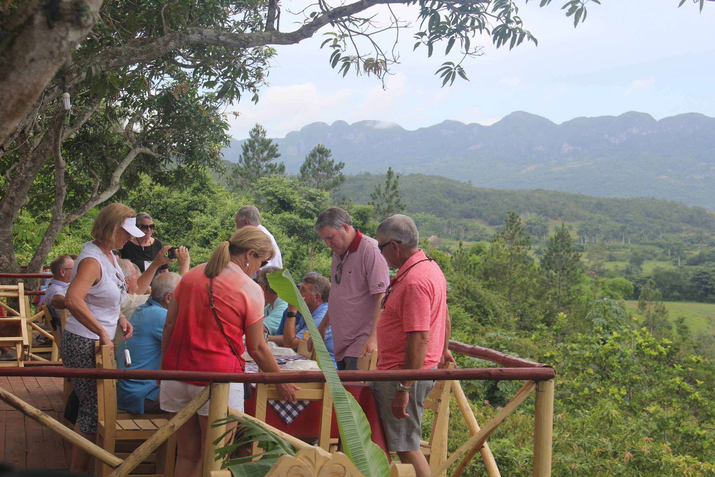 A late lunch with views that never tire. Restaurants such as this are relatively new here, but seem to be thriving. Greg Gravois, a sugarcane grower (red, striped shirt), remained unimpressed, citing similar views were readily available in Back Vacherie. 