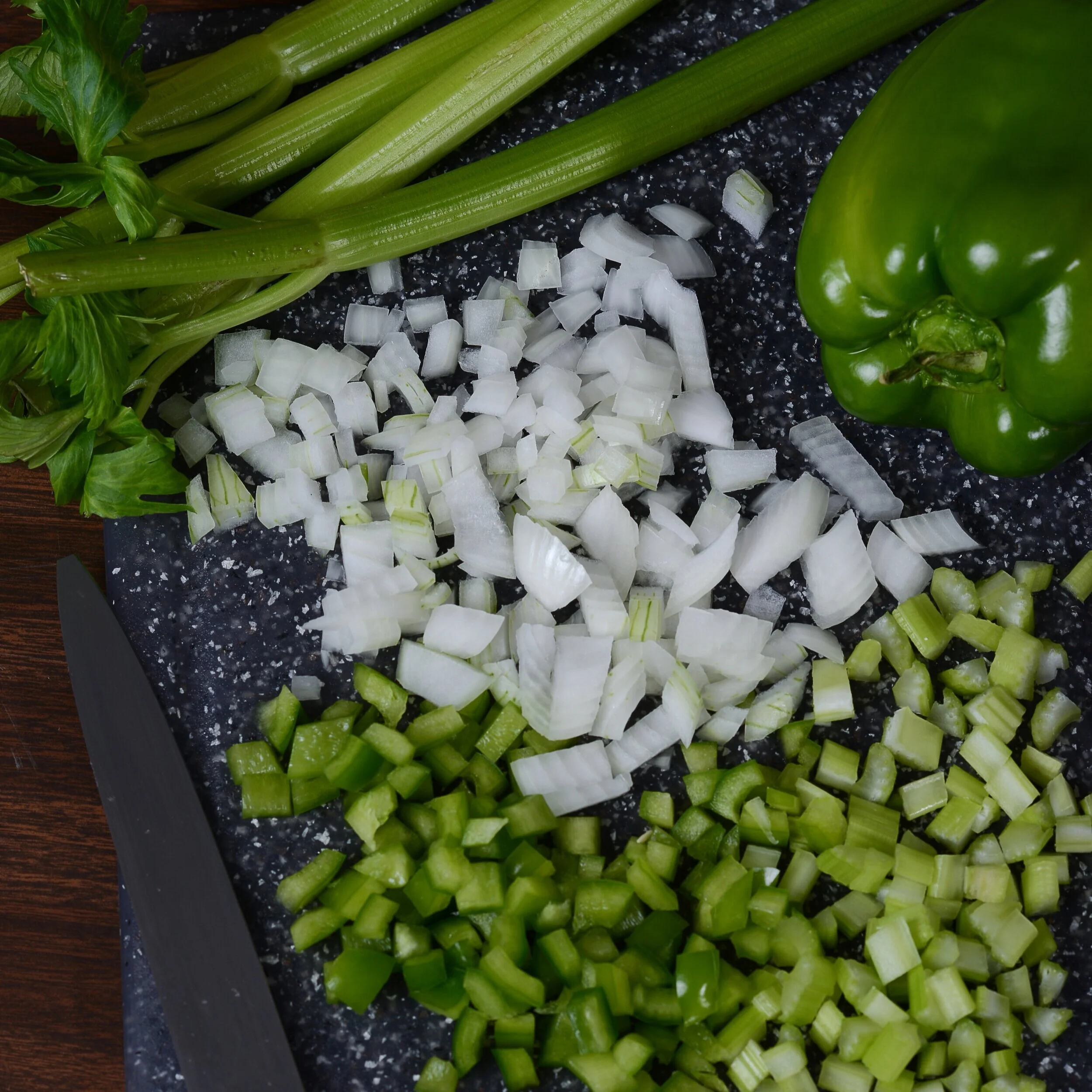 For Whom The Bell Grows: A Brief History Of The Cajun 'Holy Trinity'