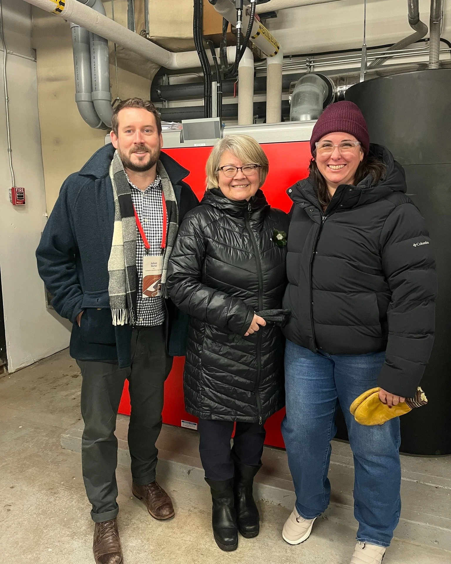 Yesterday I was excited to attend the opening of the newly-renovated Aspen Apartments building with my colleagues, including Housing NWT Minister Lucy Kuptana and MLA Reid, pictured here with me next to the new pellet boiler installed as part of the 