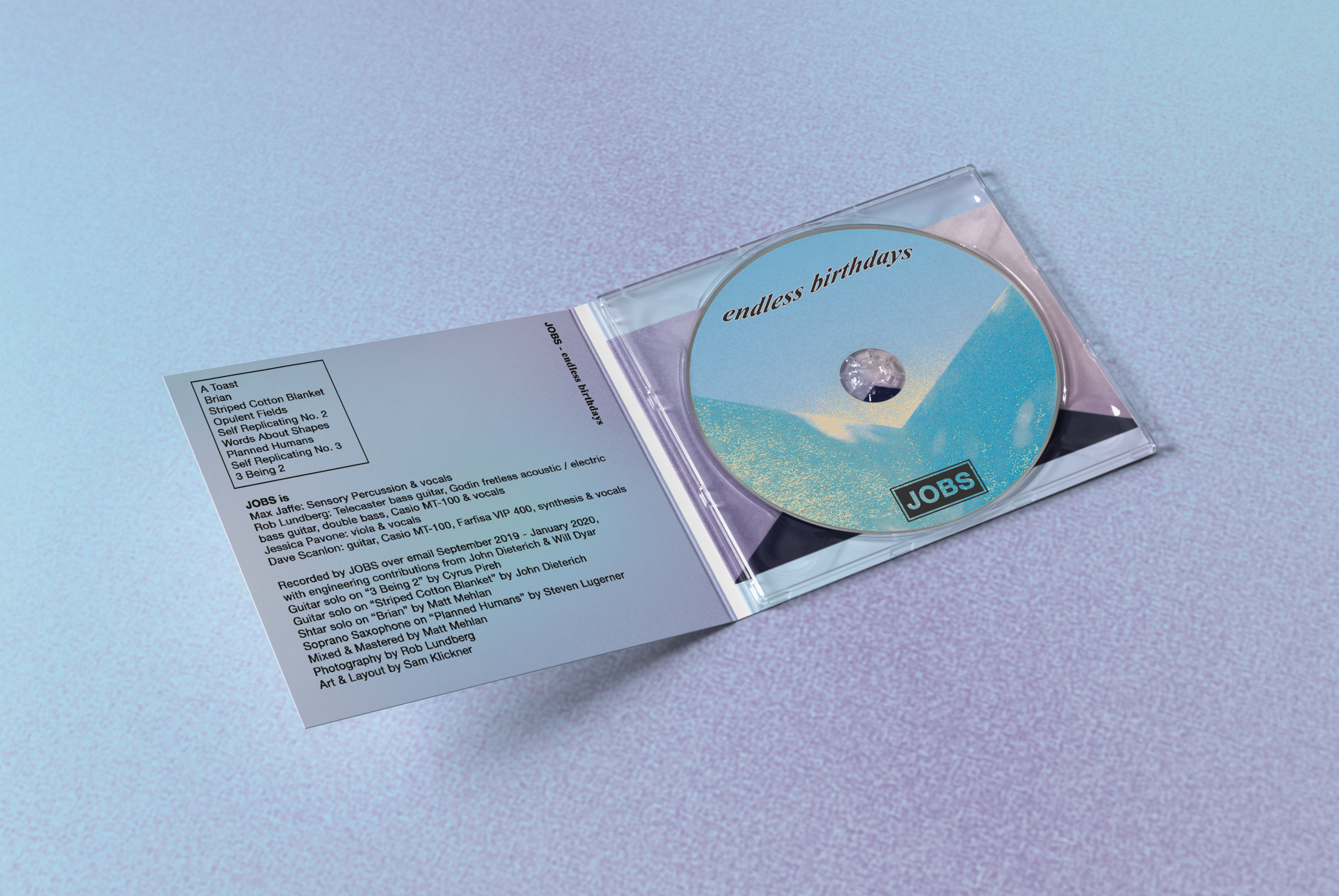 01_CD Pack Mock-up_inside spread_perspective view.png