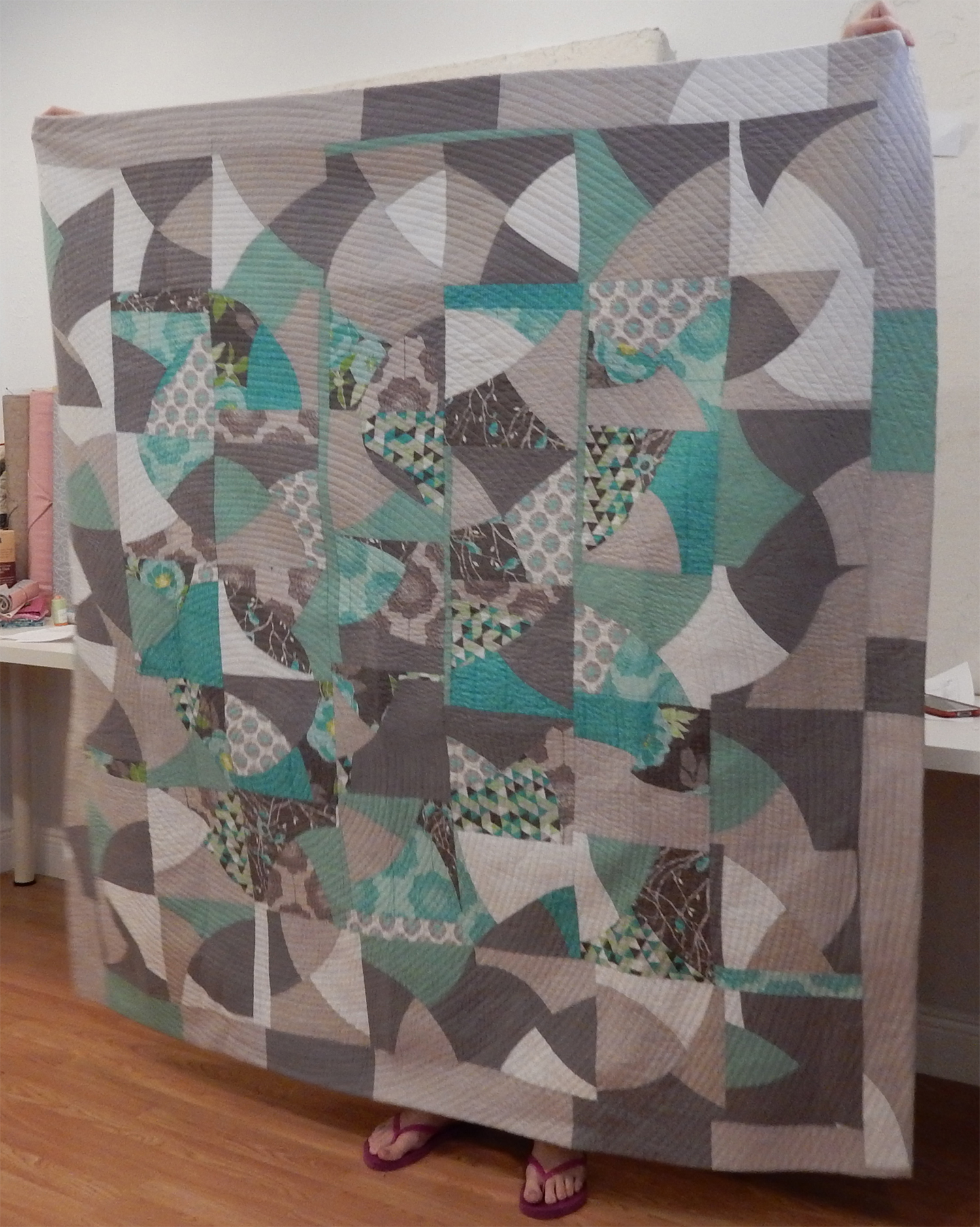 Kate Yates brought in her finished quilt from the MQG Riley Blake Challenge, from Sherri Lynn Wood's Improv Handbook