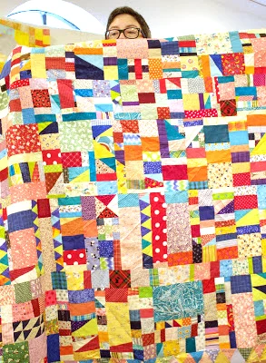 Tonya with one of her quilts at our July meeting.