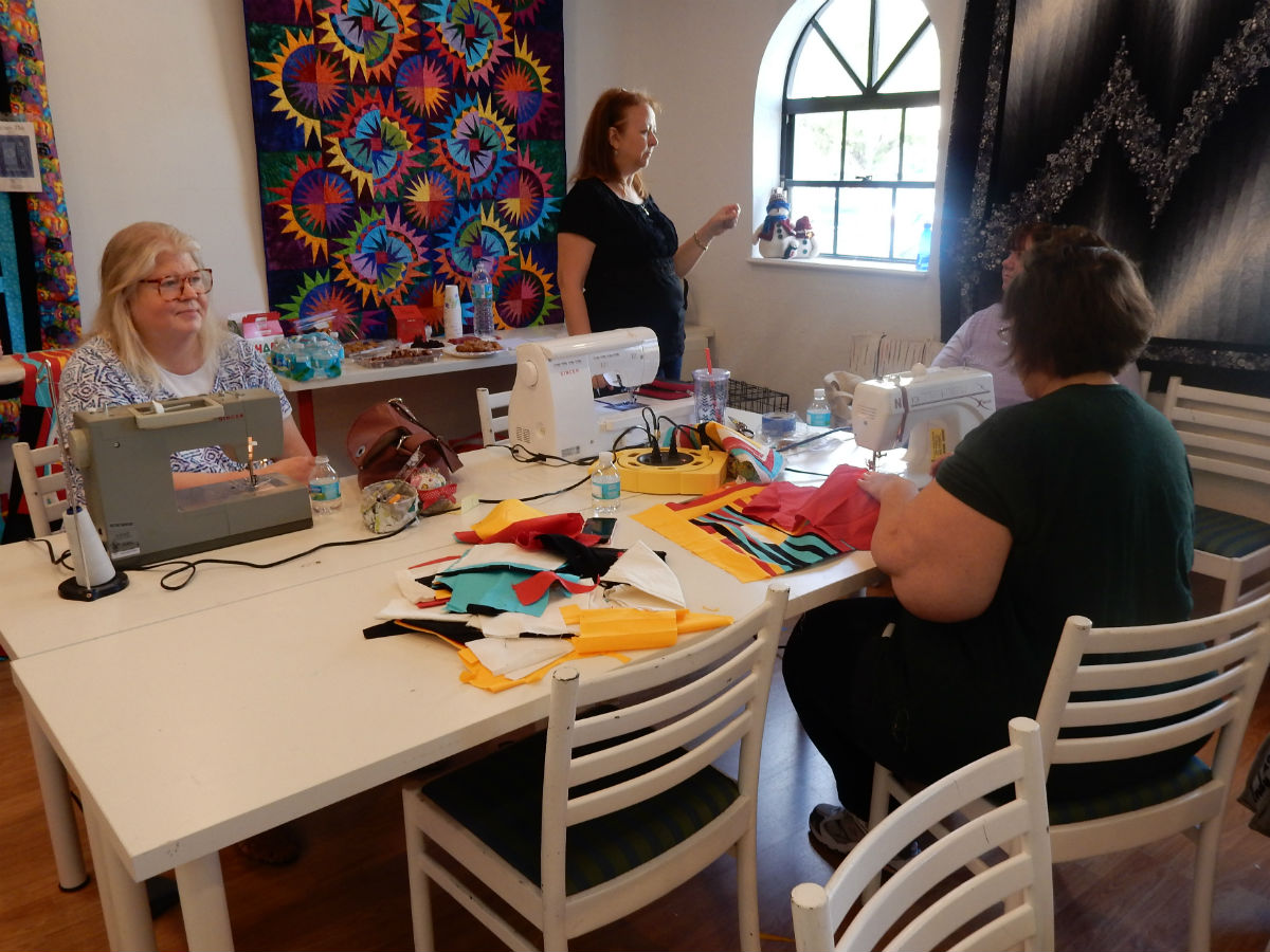 Working on the QuiltCon Charity Challenge Quilt