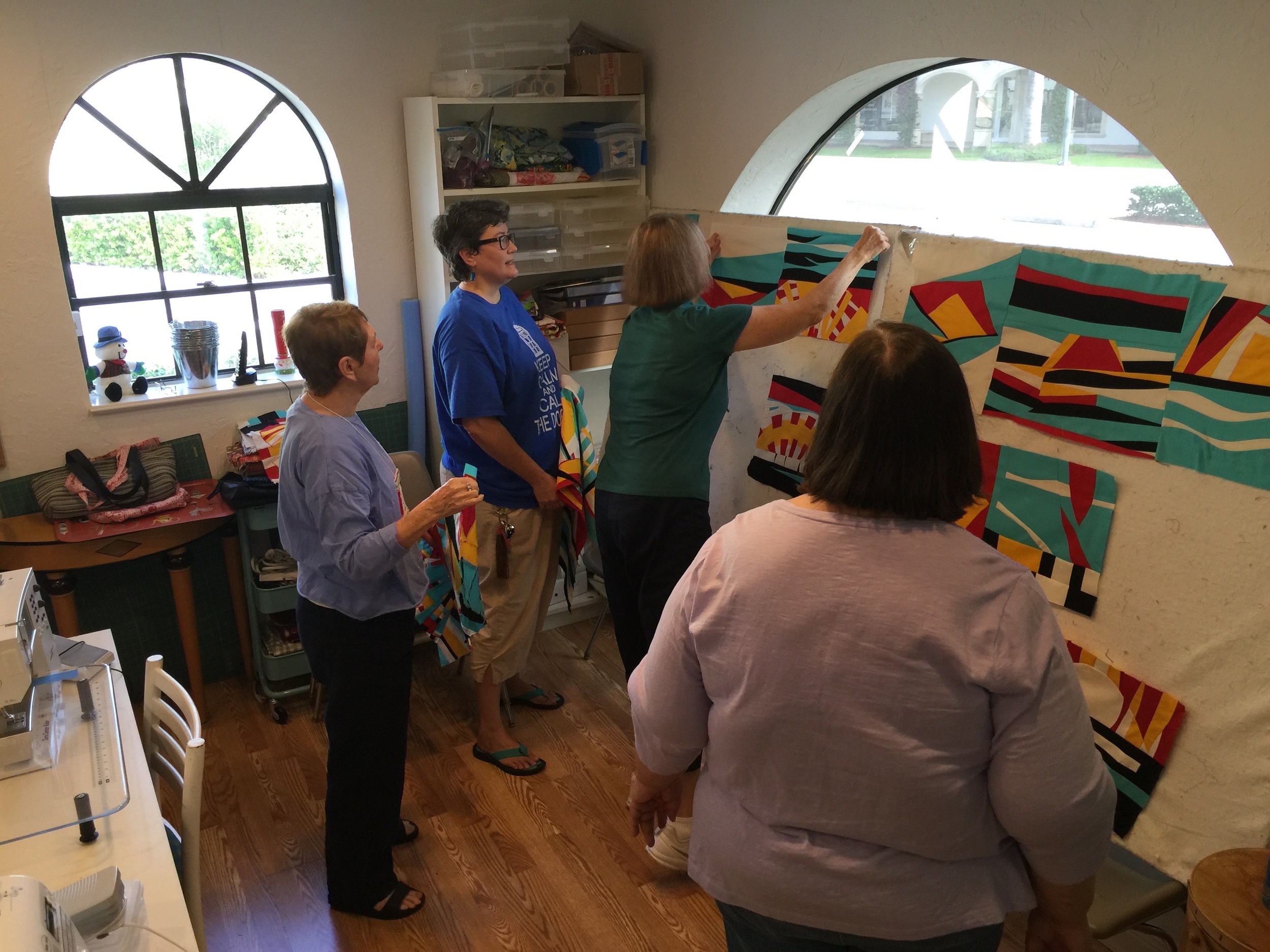 Lisa, Tonya, Jennifer and Abbie work on our layout