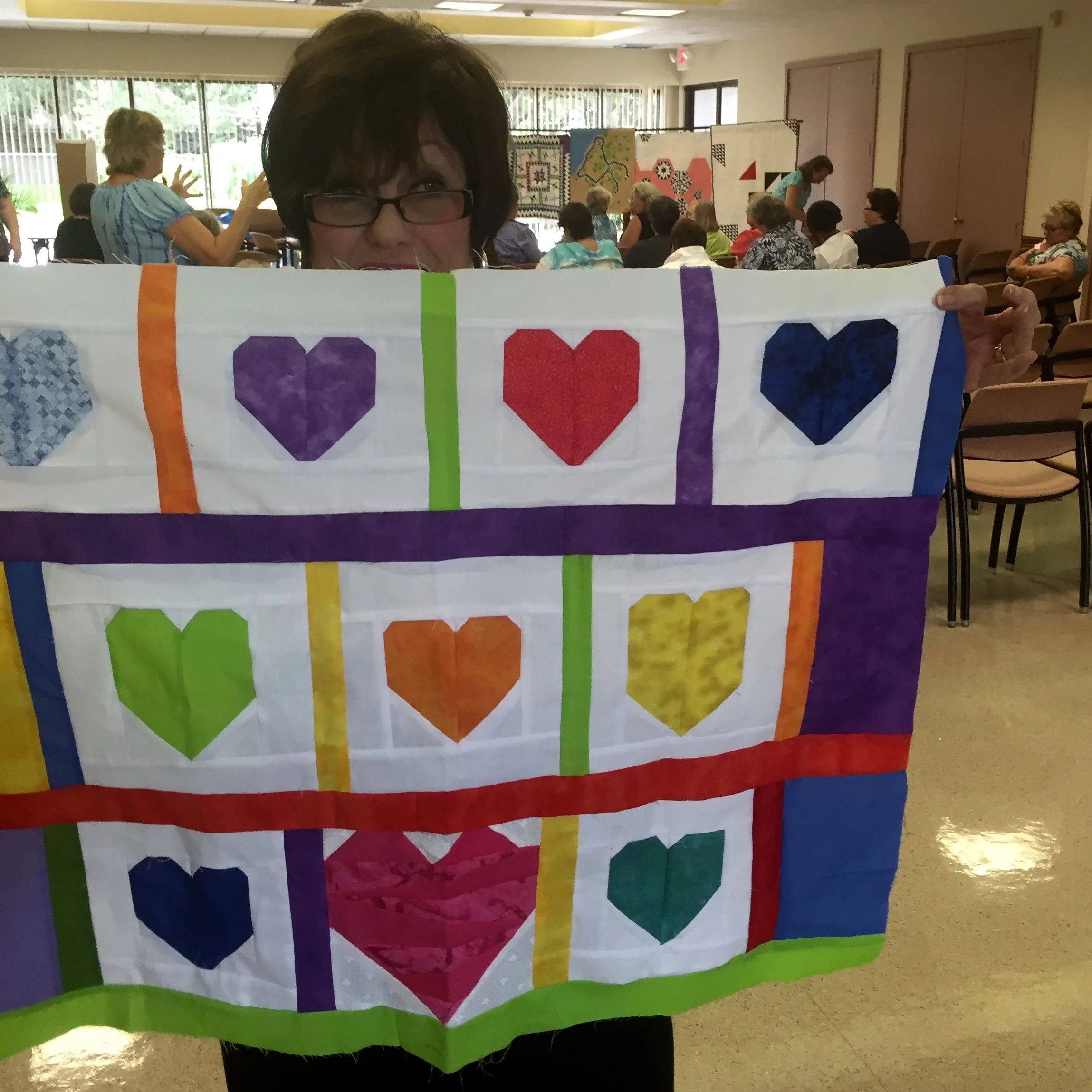 Member Marilyn Ehren sewing up love for Orlando.