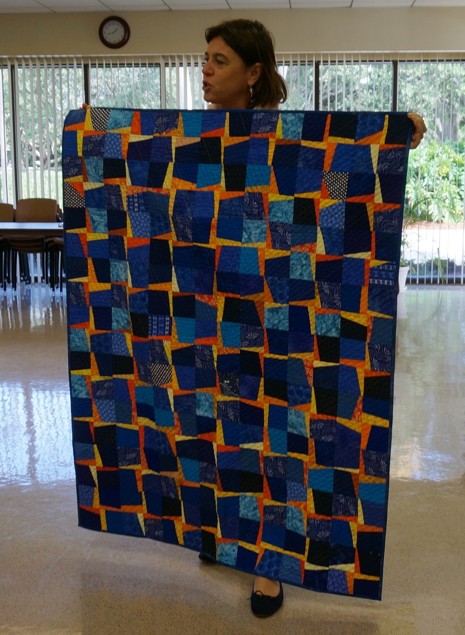 Isabella Elias and her completed BOM quilt
