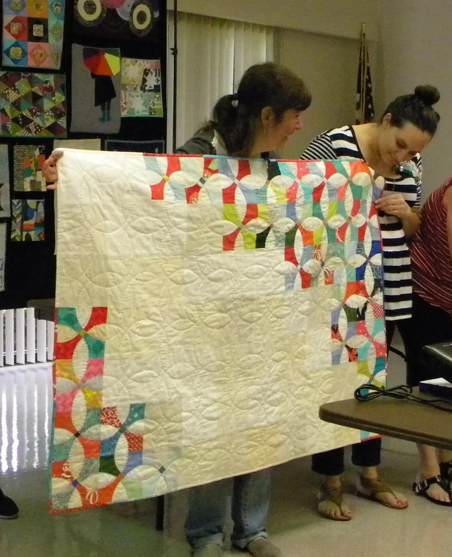 Ivy and her beautiful quilt.