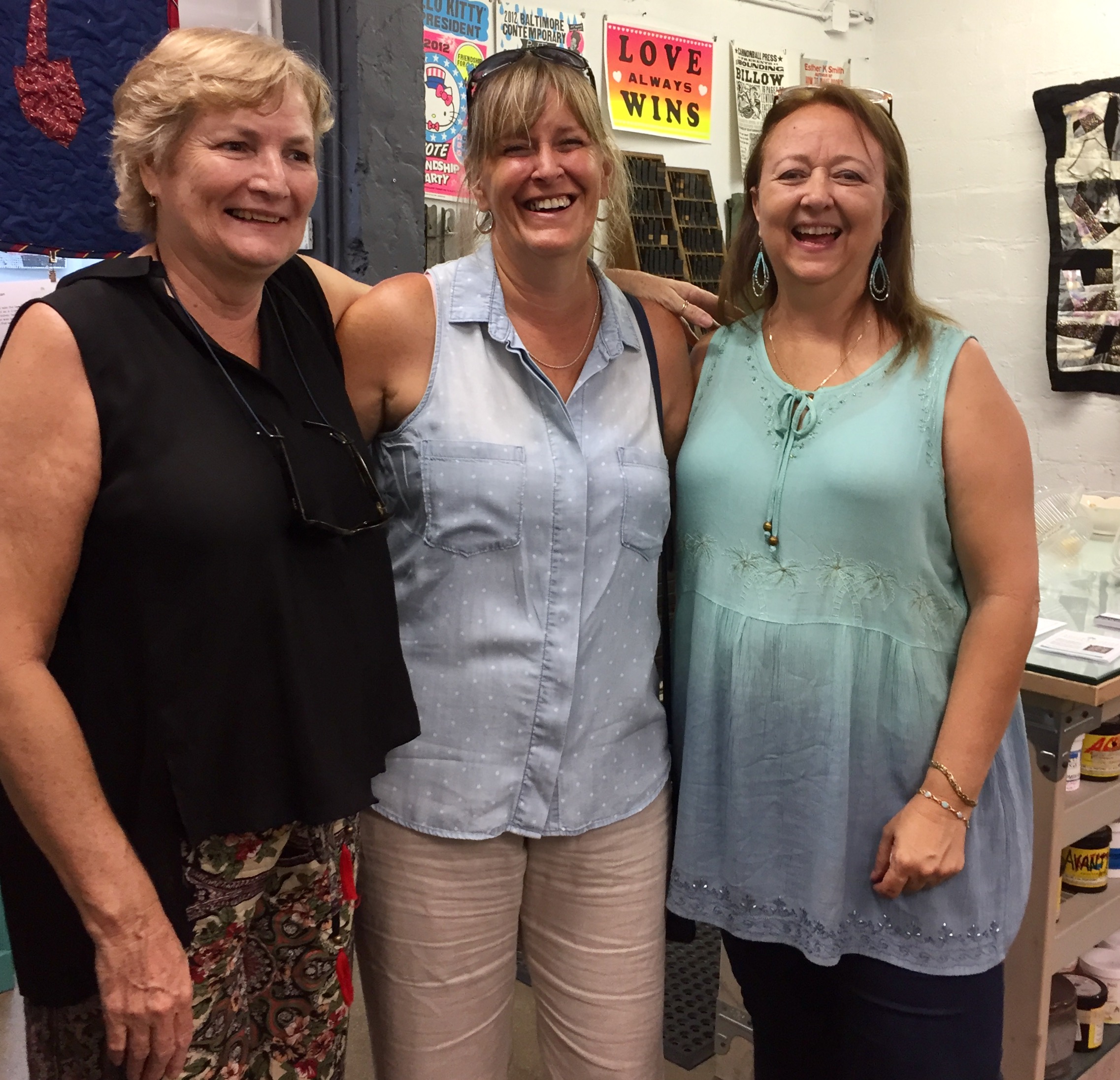  SFMQG member Karla with sister and Debby Schindall enjoying the exhibit opening. 